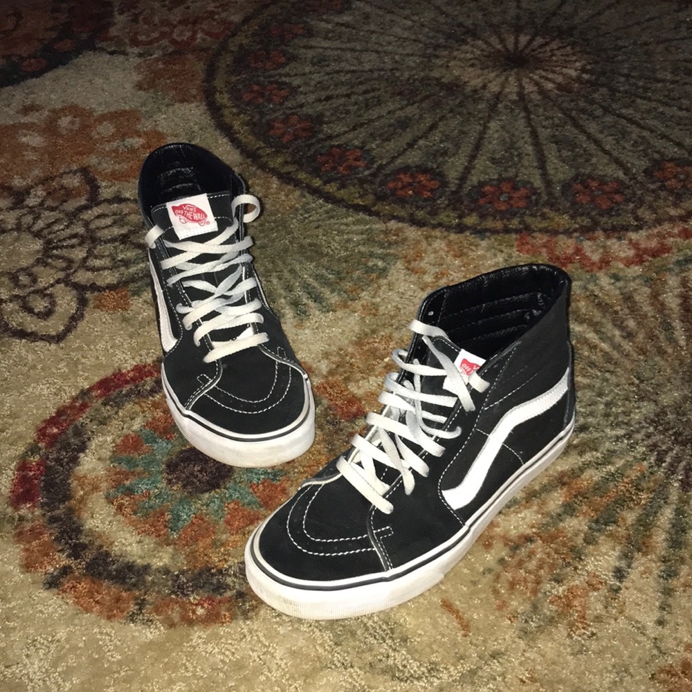 Women’s size 9 Men’s 7.5 high top Vans shoes